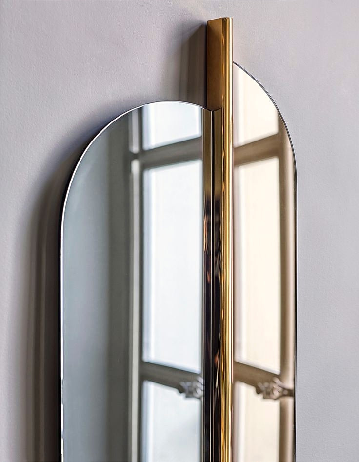 This Luxury Modern Dual-Panel Wall Mirror with Striking Vertical Gold Accent