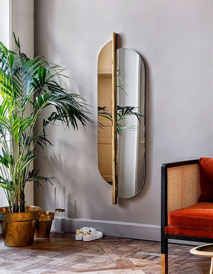 This Luxury Modern Dual-Panel Wall Mirror with Striking Vertical Gold Accent