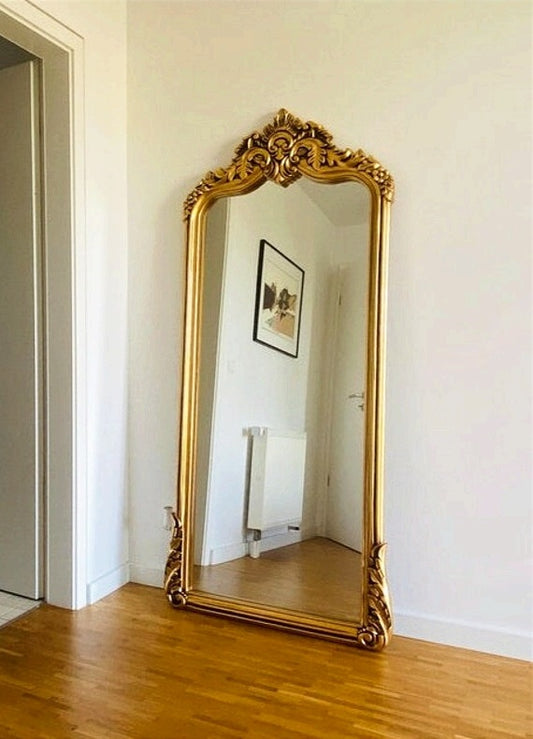 This Luxurious Full-Length Mirror Featuring a Regal Gold Frame Adorned with Intricate Baroque Detailing