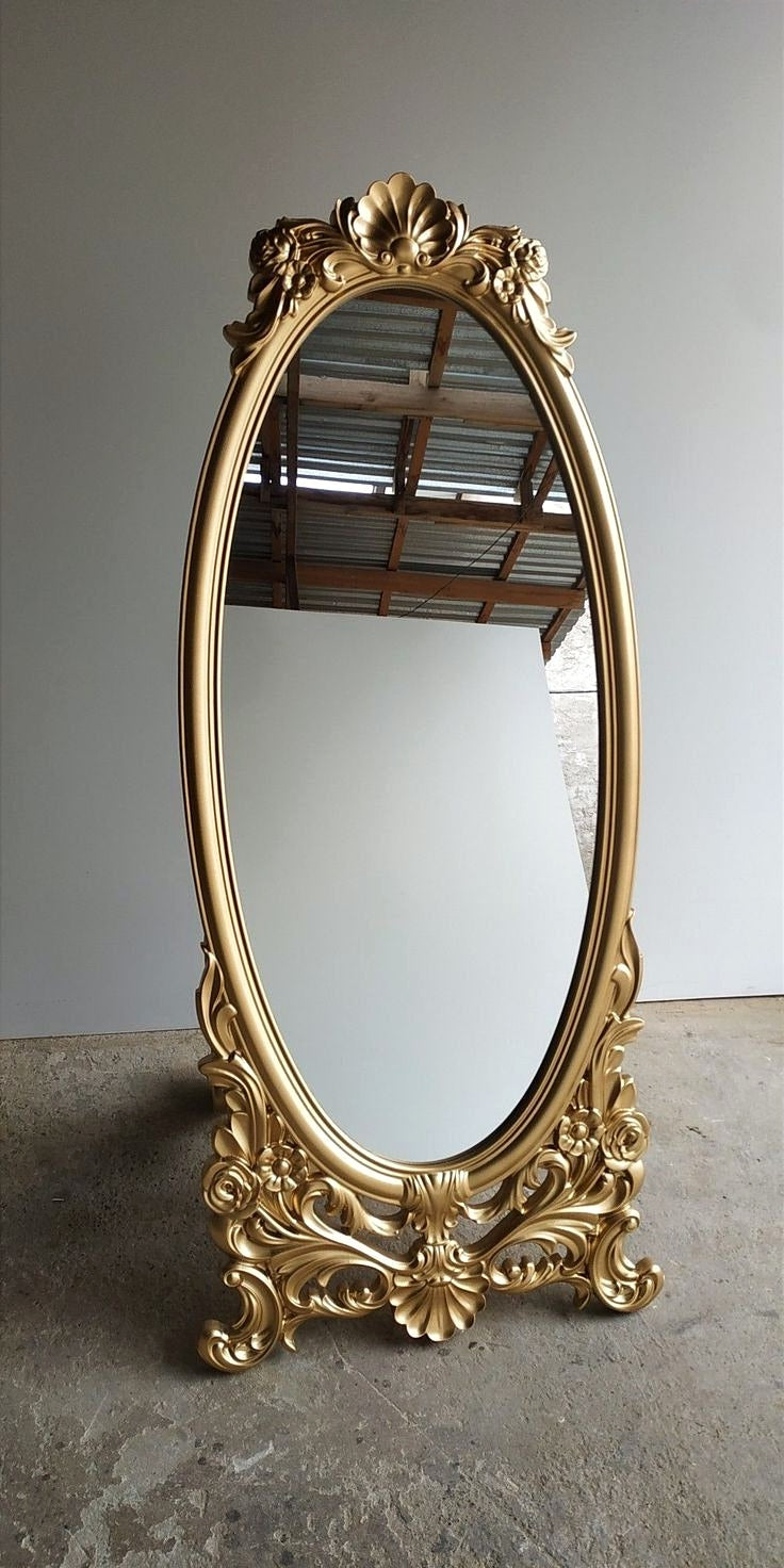 This Luxurious Gold Accent Wall Floor Mirror - Featuring An Elegant Oval Design